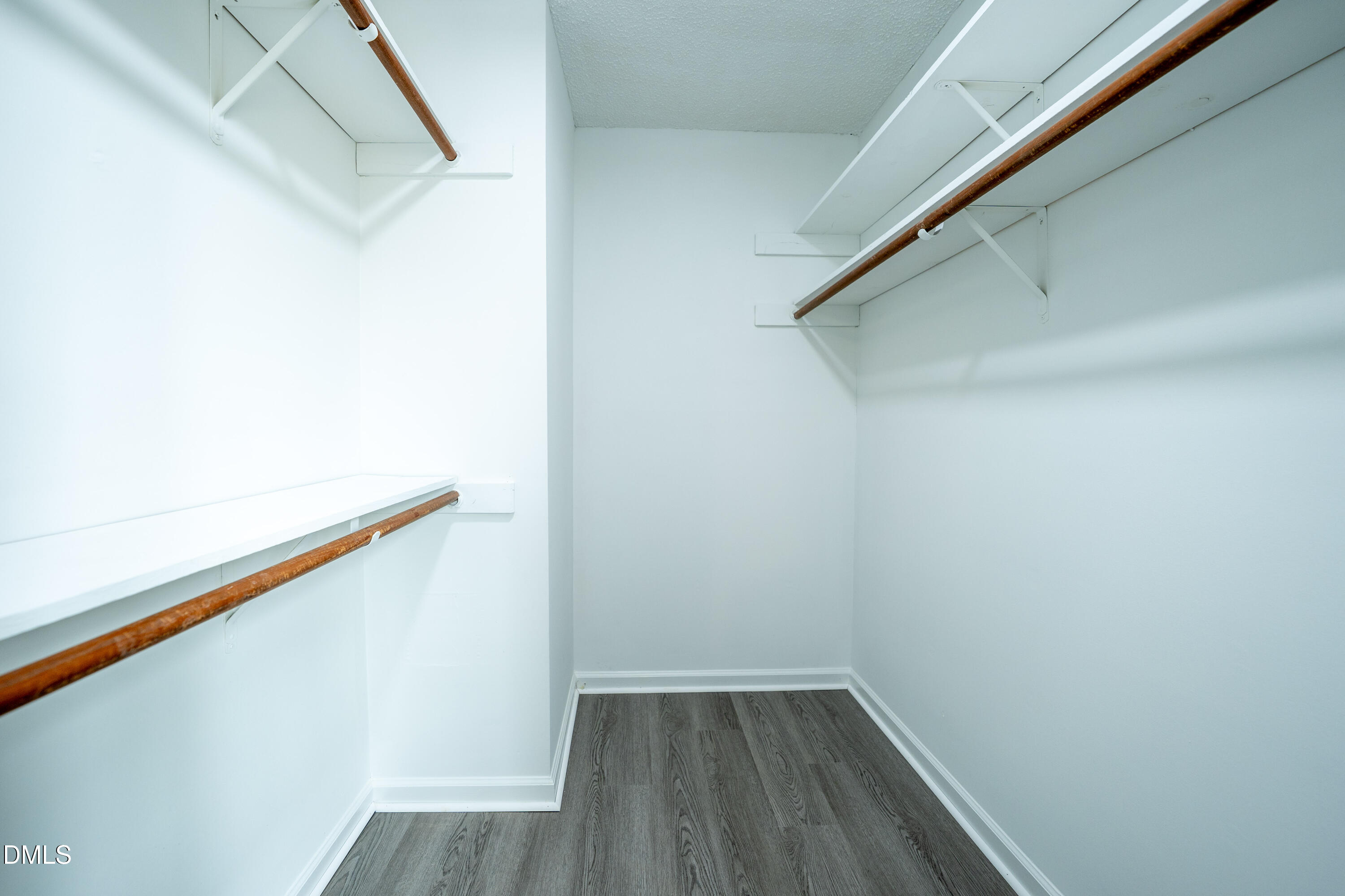 6901 Saxby Court Raleigh, NC 27613 - Photo 26 of 36 a view of a hallway with wooden floor