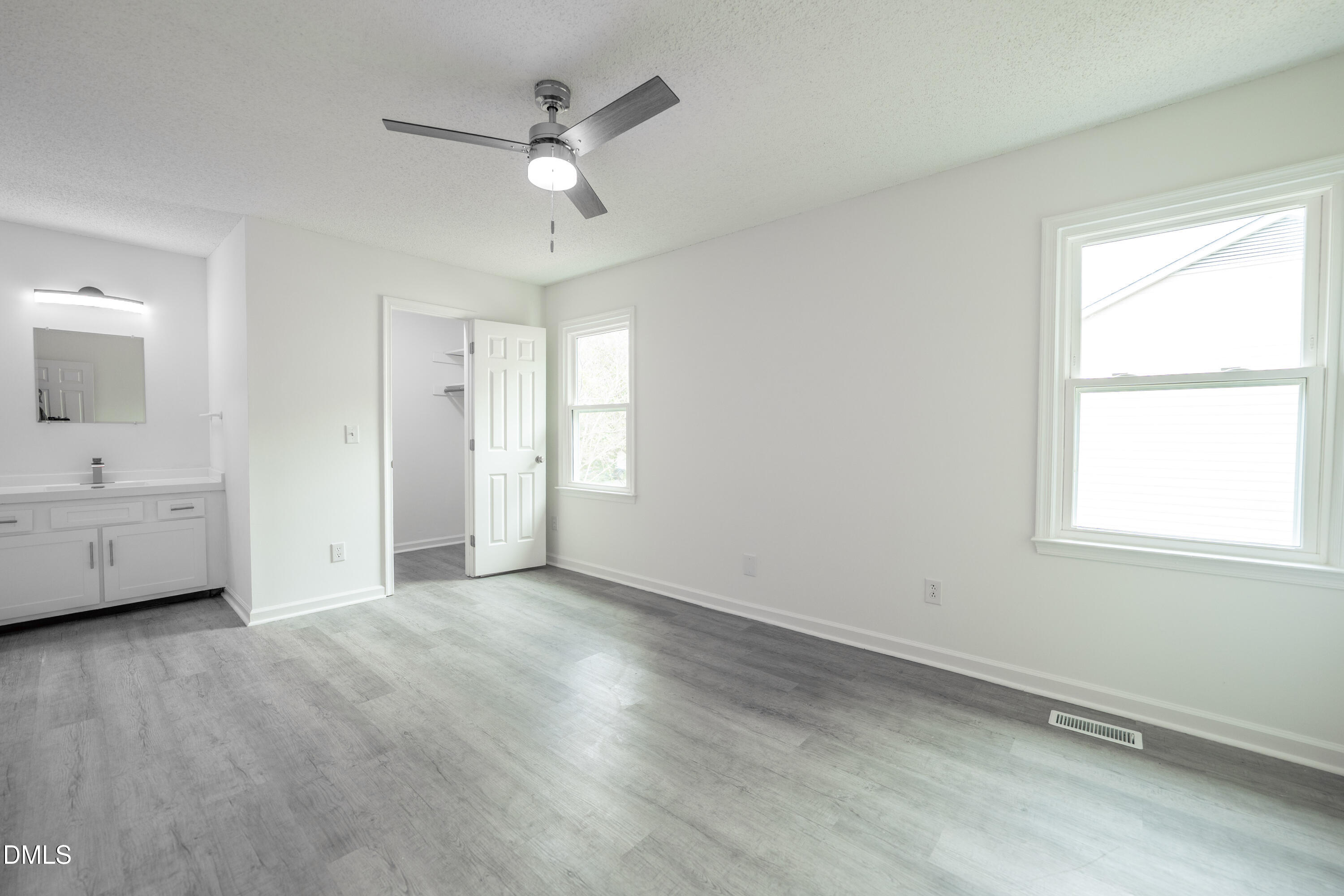 6901 Saxby Court Raleigh, NC 27613 - Photo 5 of 36 a view of an empty room with a window