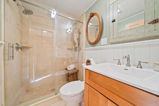 a kitchen with a refrigerator and a stove