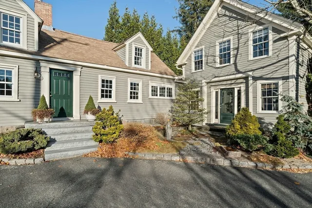 a kitchen with granite countertop lots of counter top space and refrigerator
