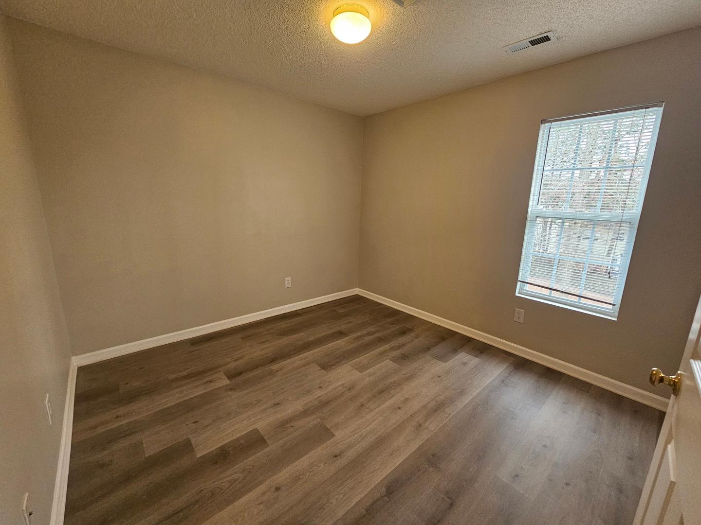 2341 Brasstown Lane Apex, NC 27502 - Photo 13 of 24 wooden floor in an empty room
