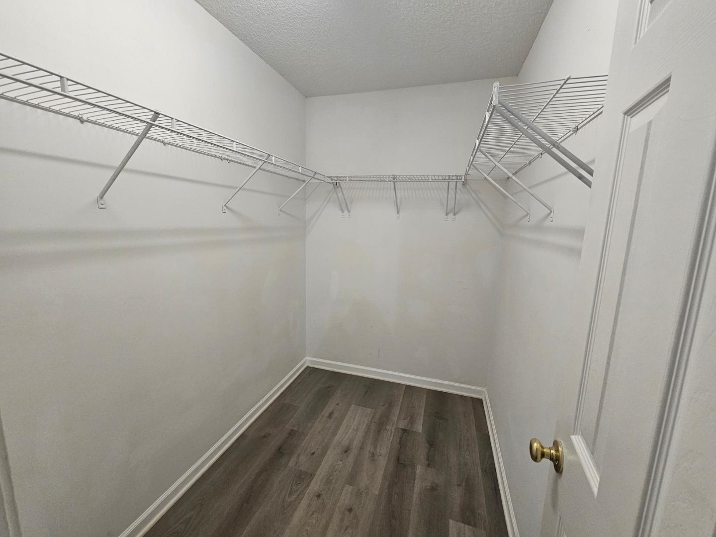 2341 Brasstown Lane Apex, NC 27502 - Photo 18 of 24 a view of a room with racks on the wall