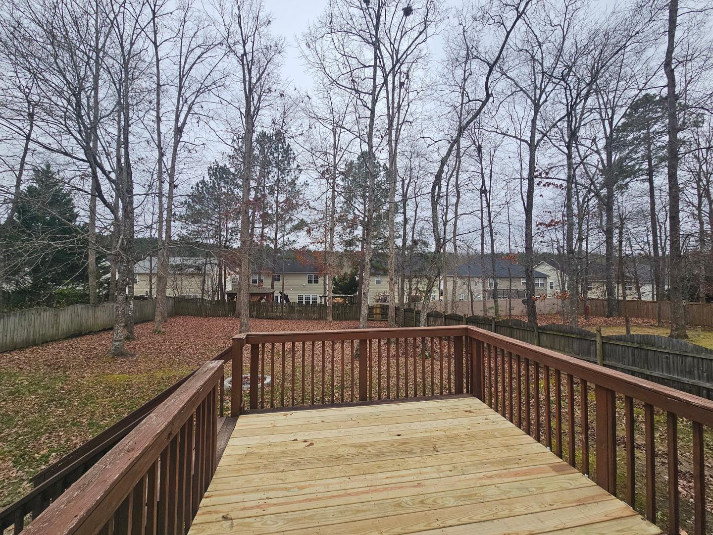 2341 Brasstown Lane Apex, NC 27502 - Photo 22 of 24 a view of balcony with wooden floor and fence