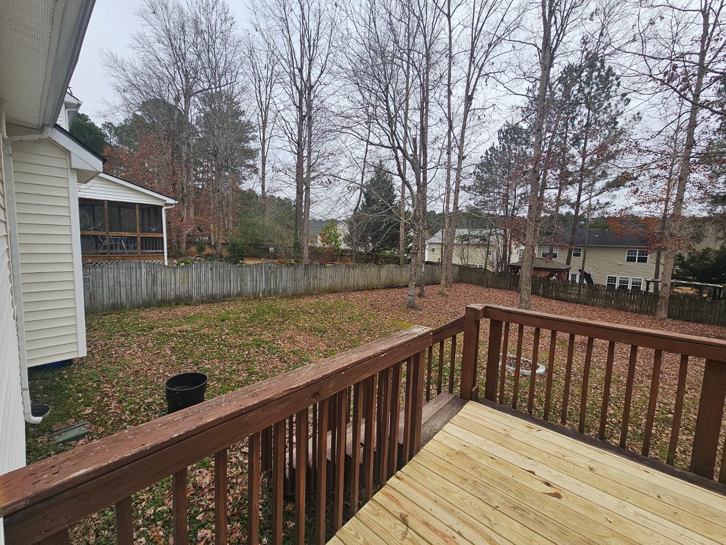 2341 Brasstown Lane Apex, NC 27502 - Photo 24 of 24 a view of deck with mountain and wooden fence