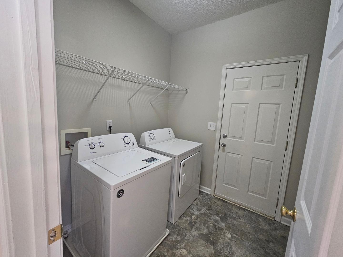 2341 Brasstown Lane Apex, NC 27502 - Photo 10 of 24 a utility room with dryer and washer