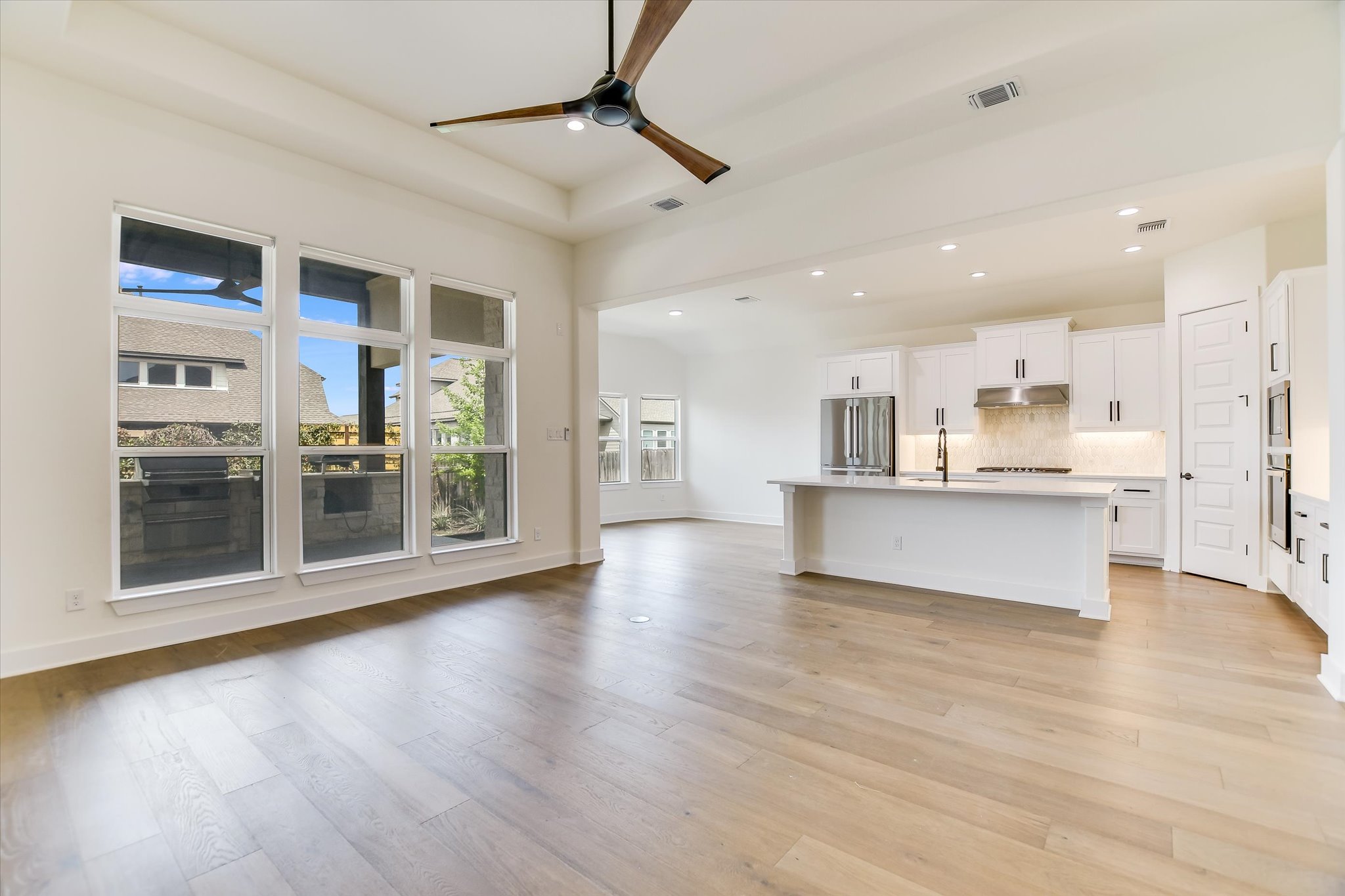 4300 Allenbrook Drive Pflugerville, TX 78660 - Photo 11 of 40 a view of kitchen with stainless steel appliances refrigerator oven and cabinets