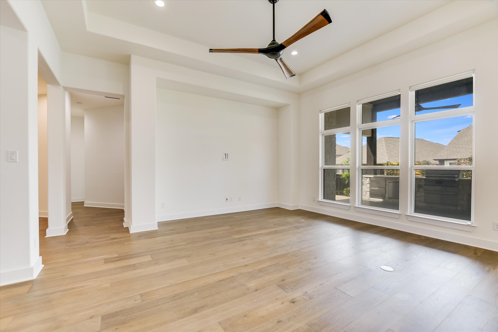 4300 Allenbrook Drive Pflugerville, TX 78660 - Photo 13 of 40 a view of an empty room with a window and wooden floor