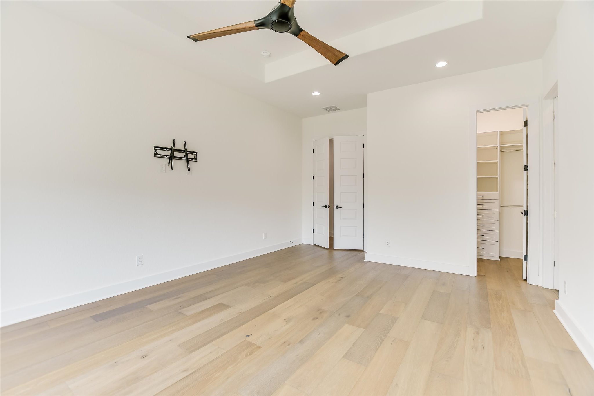 4300 Allenbrook Drive Pflugerville, TX 78660 - Photo 21 of 40 wooden floor in an empty room with a window