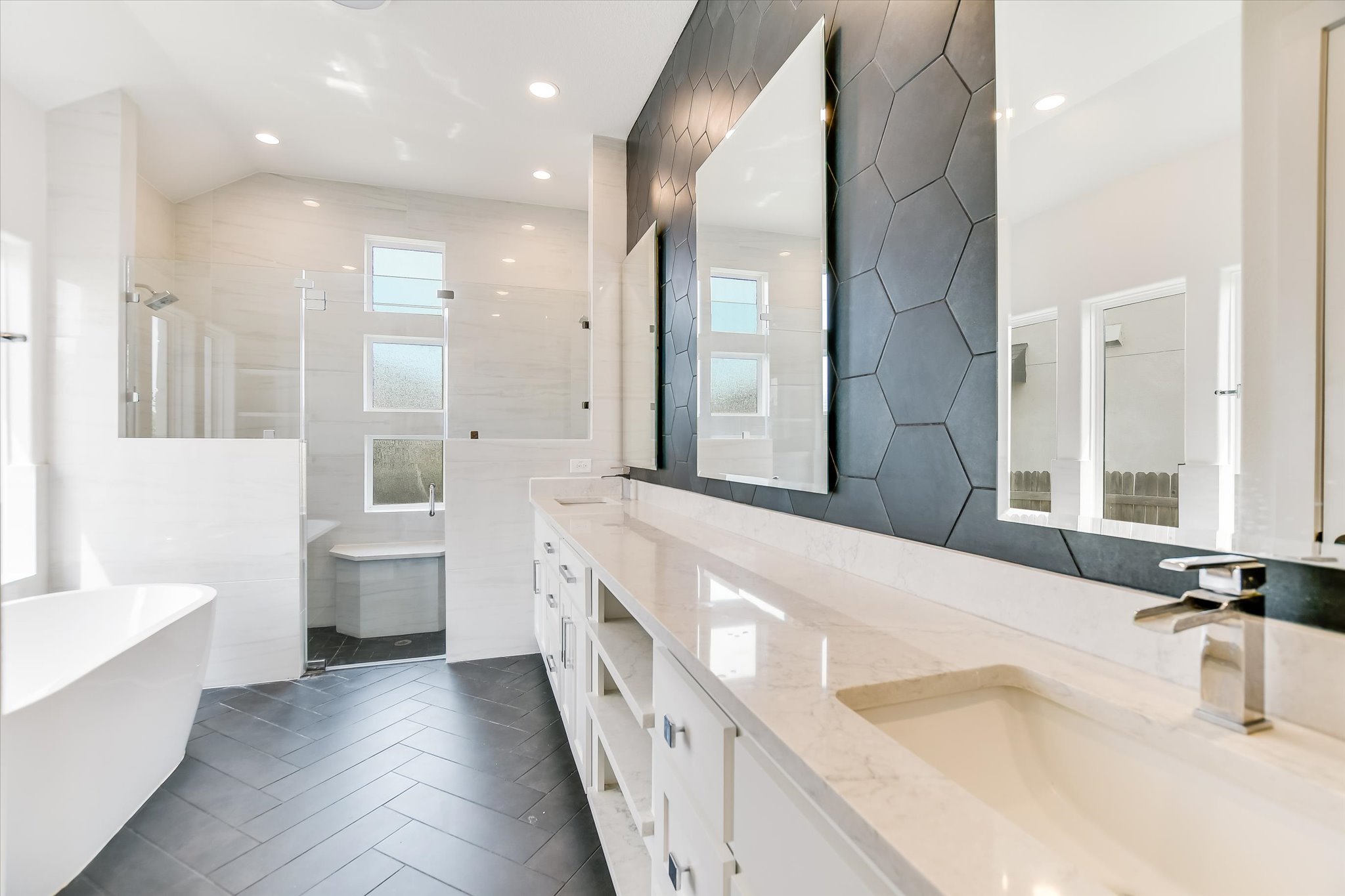 4300 Allenbrook Drive Pflugerville, TX 78660 - Photo 23 of 40 a bathroom with a bathtub sink and toilet