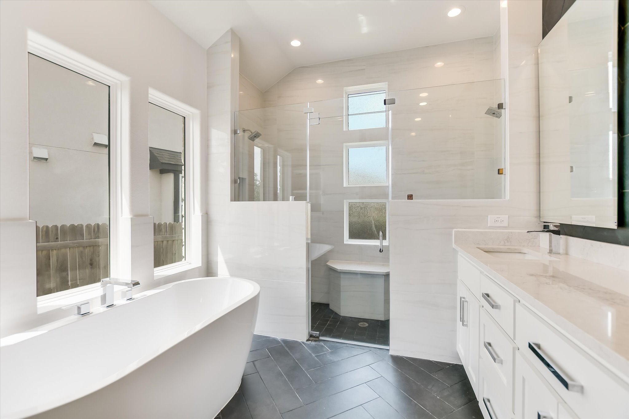 4300 Allenbrook Drive Pflugerville, TX 78660 - Photo 25 of 40 a spacious bathroom with a tub sink shower and mirror