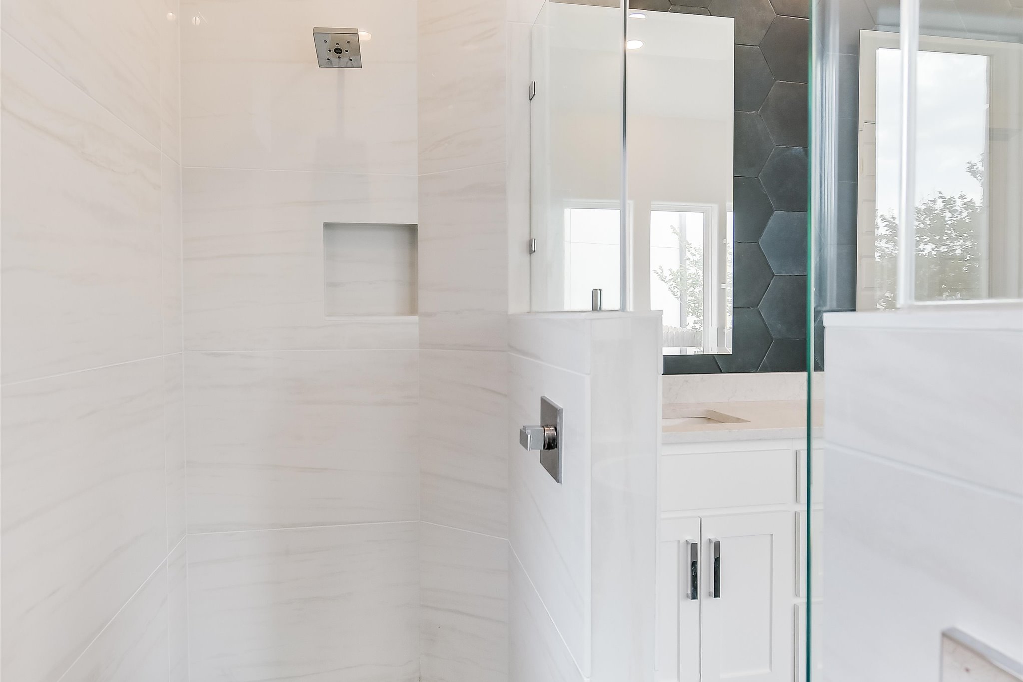 4300 Allenbrook Drive Pflugerville, TX 78660 - Photo 26 of 40 a bathroom with a shower and a window