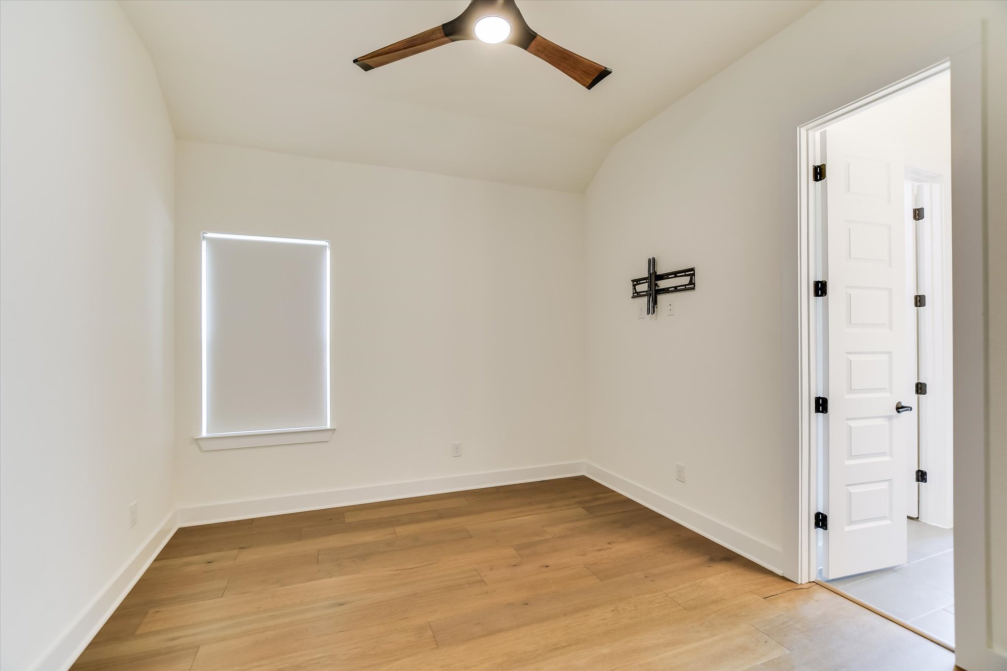 4300 Allenbrook Drive Pflugerville, TX 78660 - Photo 32 of 40 an empty room with a window and a ceiling fan