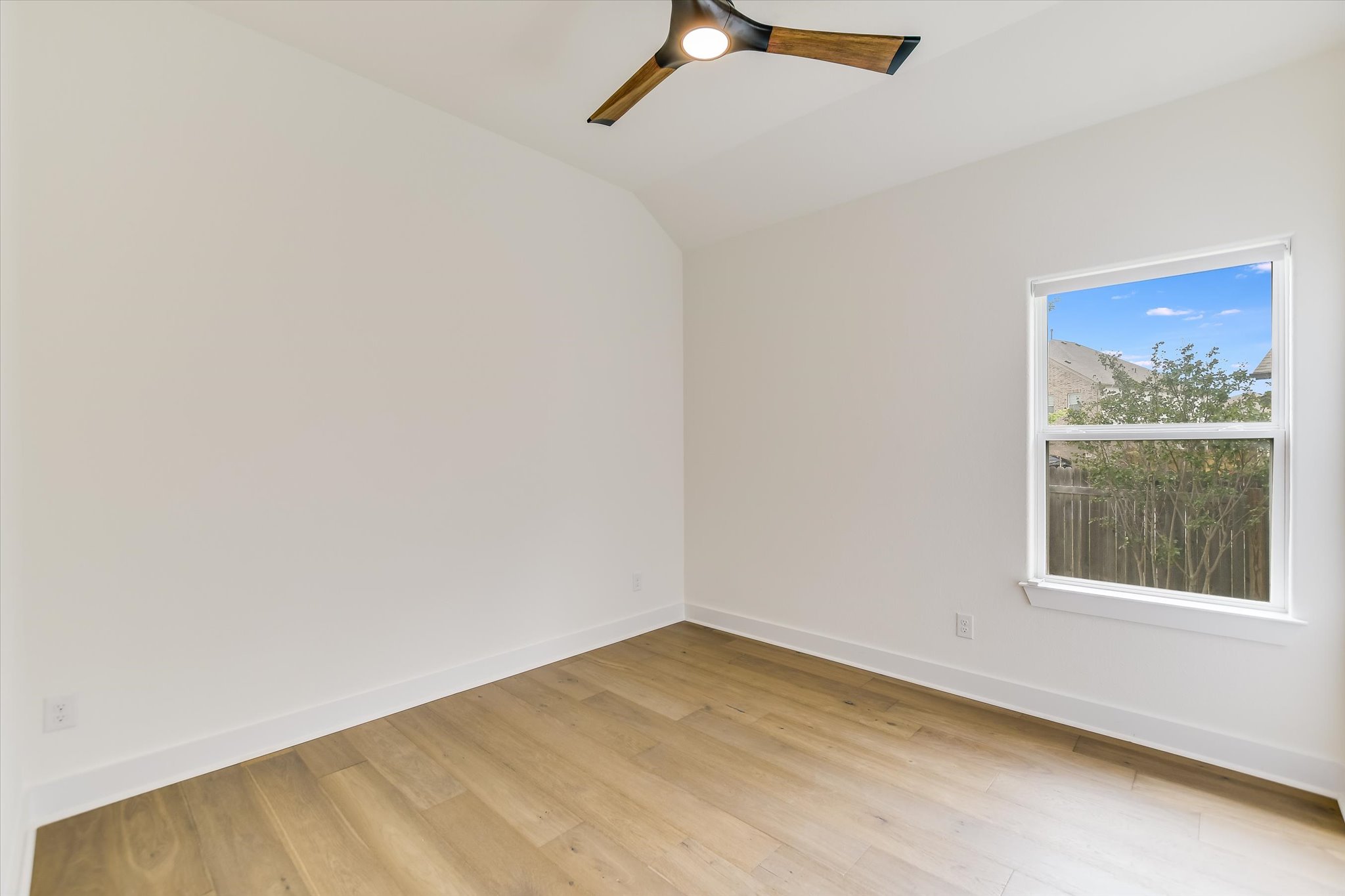 4300 Allenbrook Drive Pflugerville, TX 78660 - Photo 35 of 40 an empty room with a window