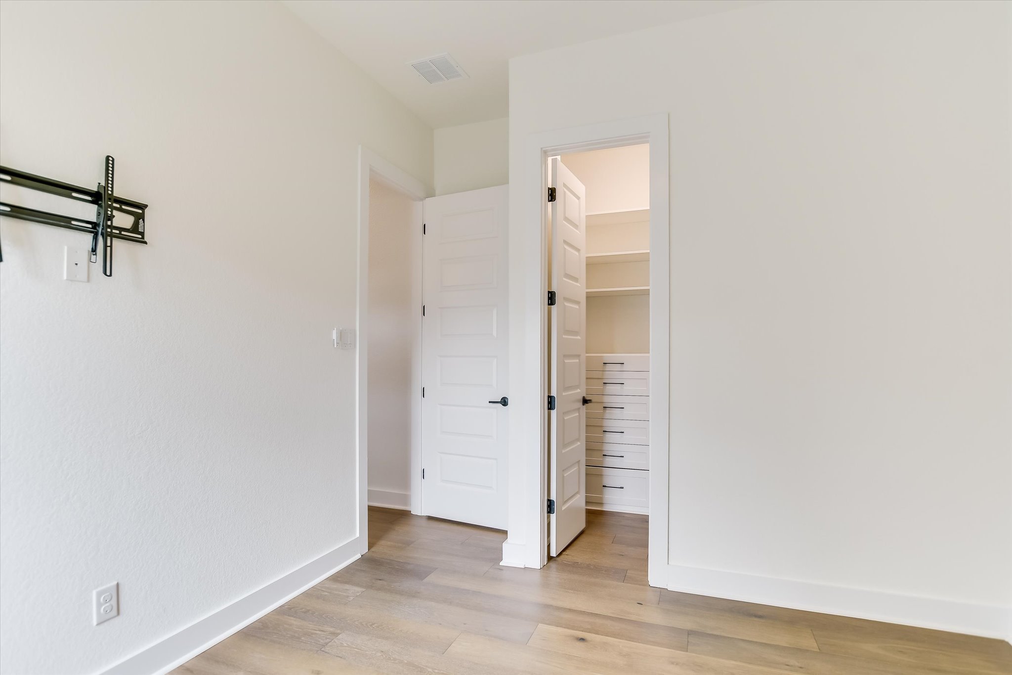 4300 Allenbrook Drive Pflugerville, TX 78660 - Photo 36 of 40 a view of a room with wooden floor