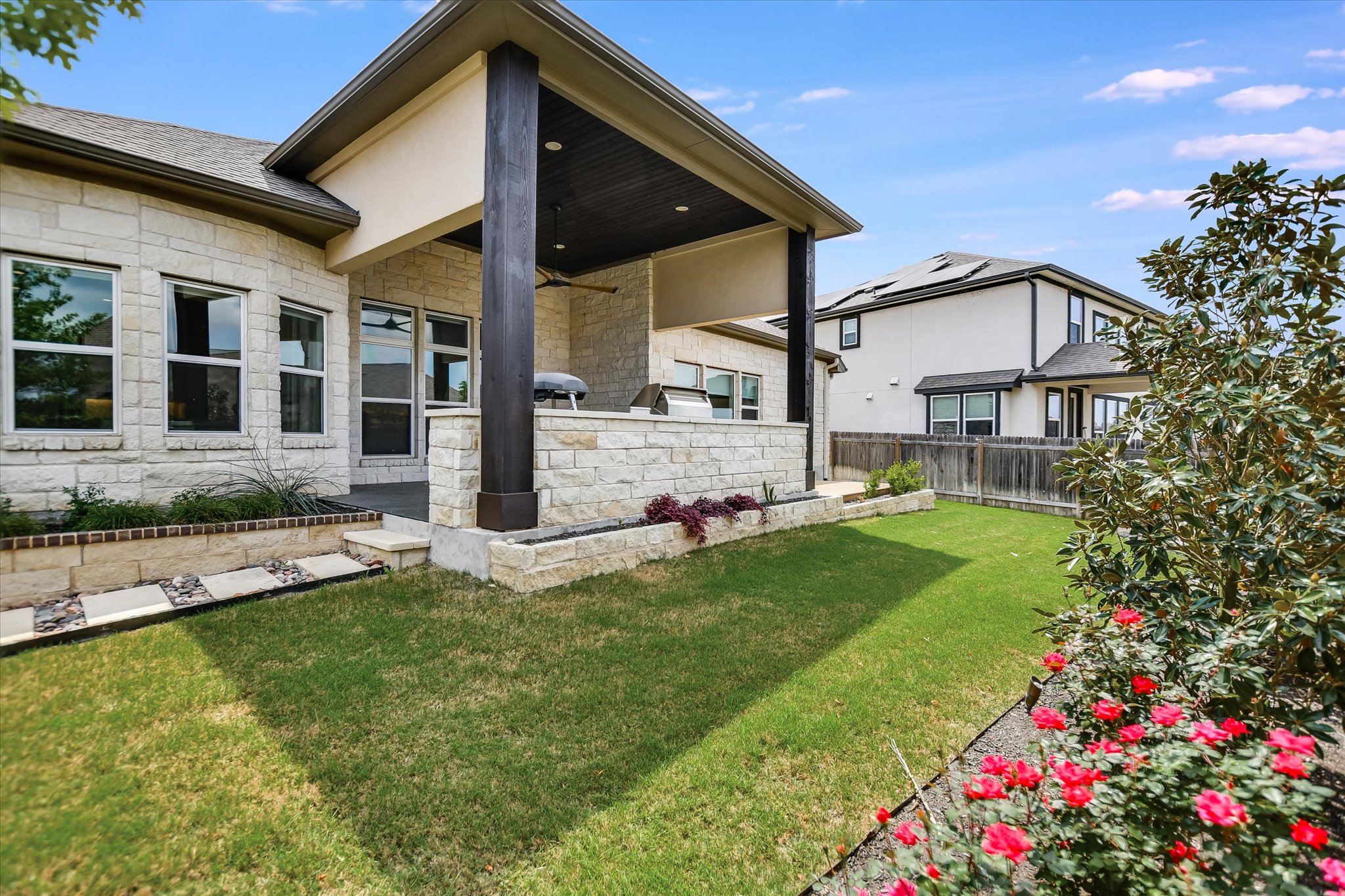 4300 Allenbrook Drive Pflugerville, TX 78660 - Photo 39 of 40 a view of a house with a big yard and potted plants