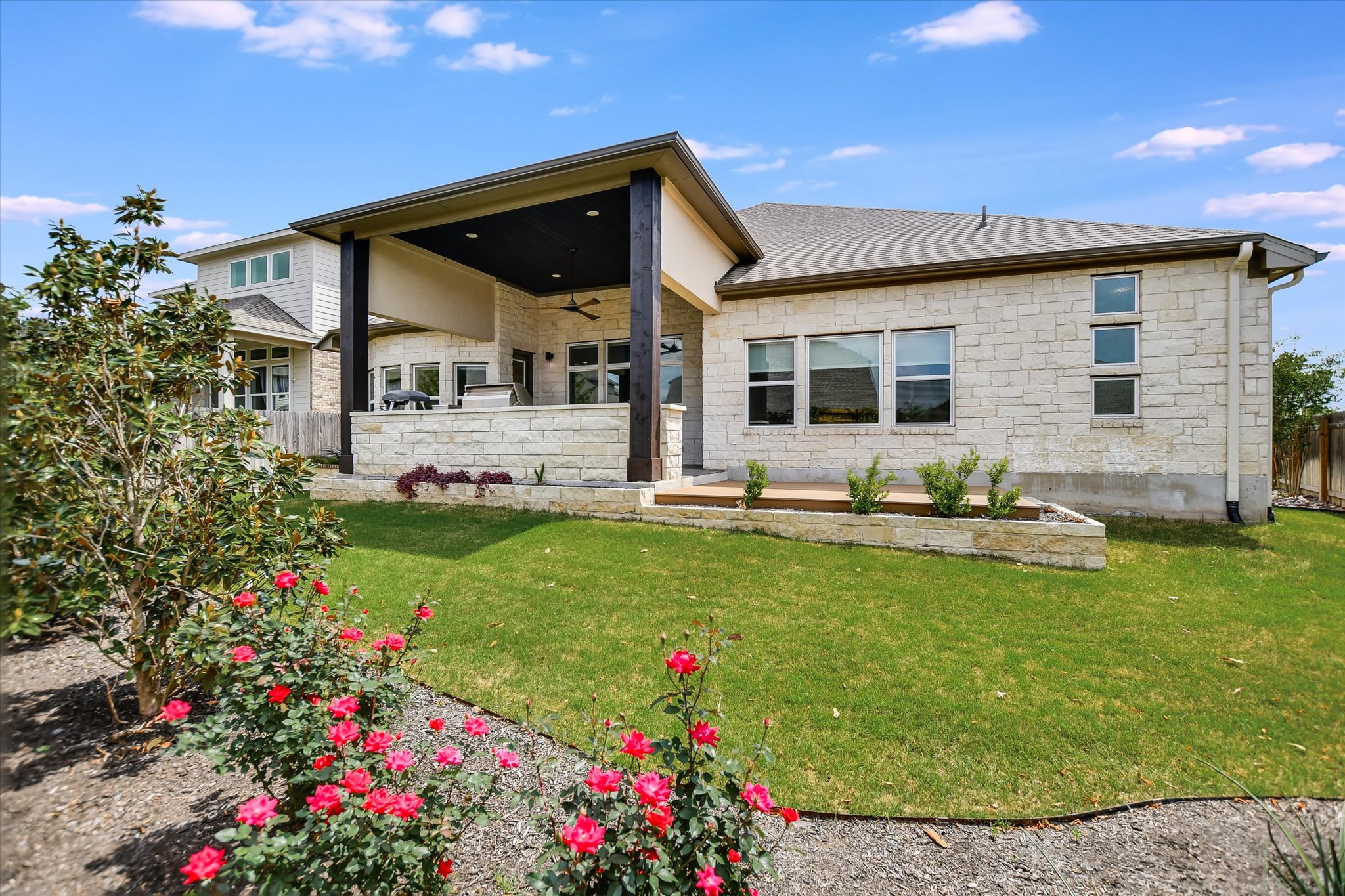 4300 Allenbrook Drive Pflugerville, TX 78660 - Photo 40 of 40 a front view of house with yard and outdoor seating