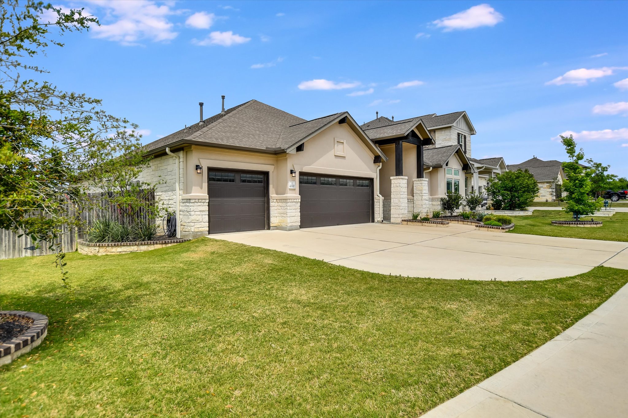 4300 Allenbrook Drive Pflugerville, TX 78660 - Photo 4 of 40 a front view of a house with a yard