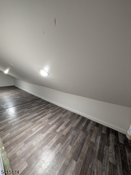 437 East 21st Street Paterson, NJ 07513 - Photo 9 of 12 a view of room and wooden floor
