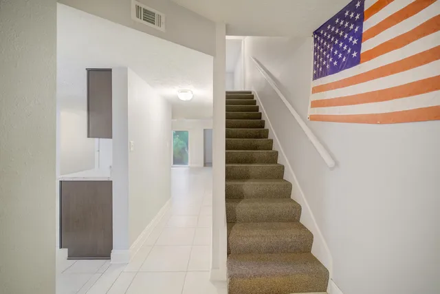 a view of entryway with wooden floor