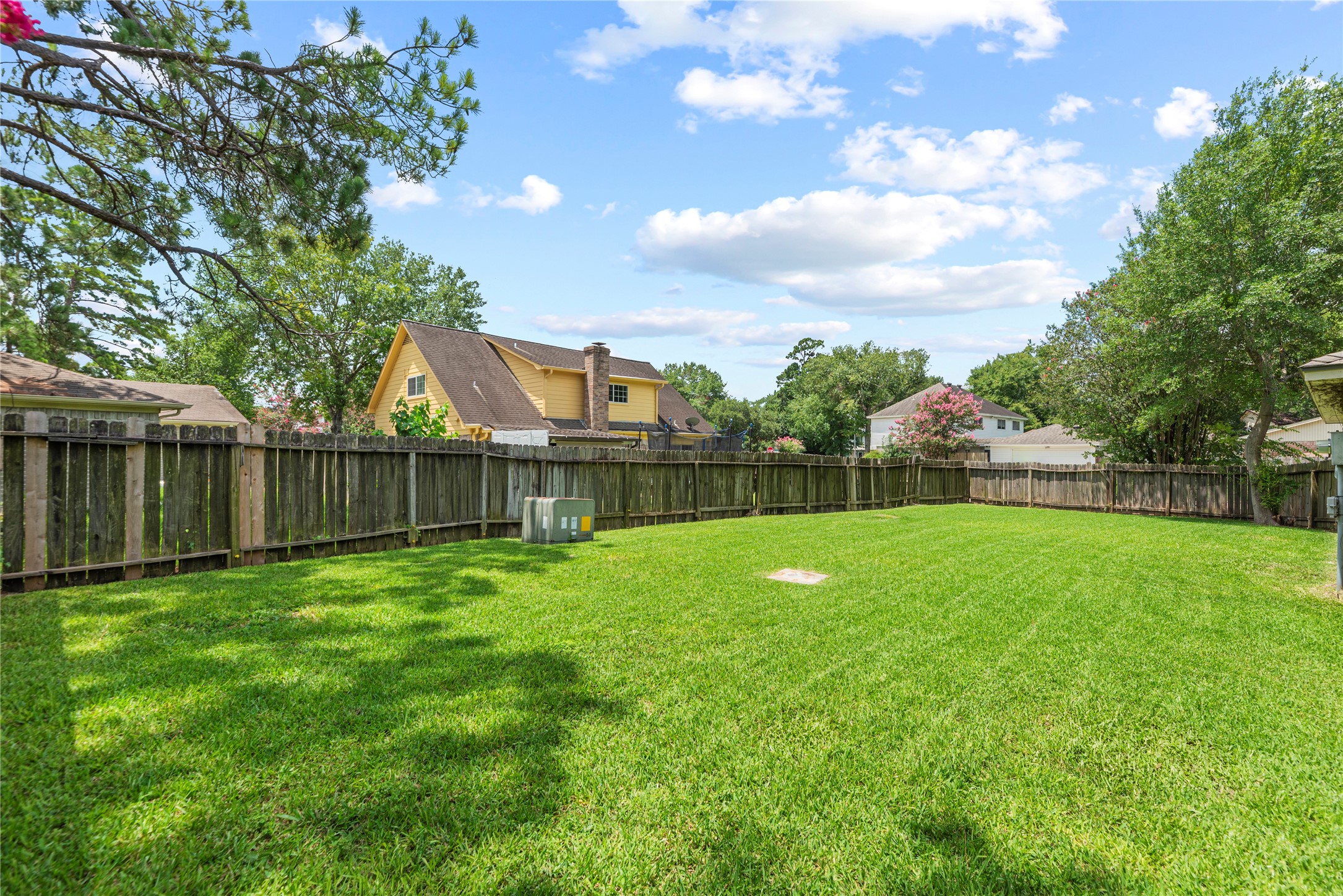 6931 Sandy Knolls Drive Spring, TX 77379 - Photo 21 of 21 Your backyard has well-maintained grass, a wooden fence, ideal for outdoor activities and entertaining.
**6931 Sandy Knolls Dr., Spring, TX 77379**