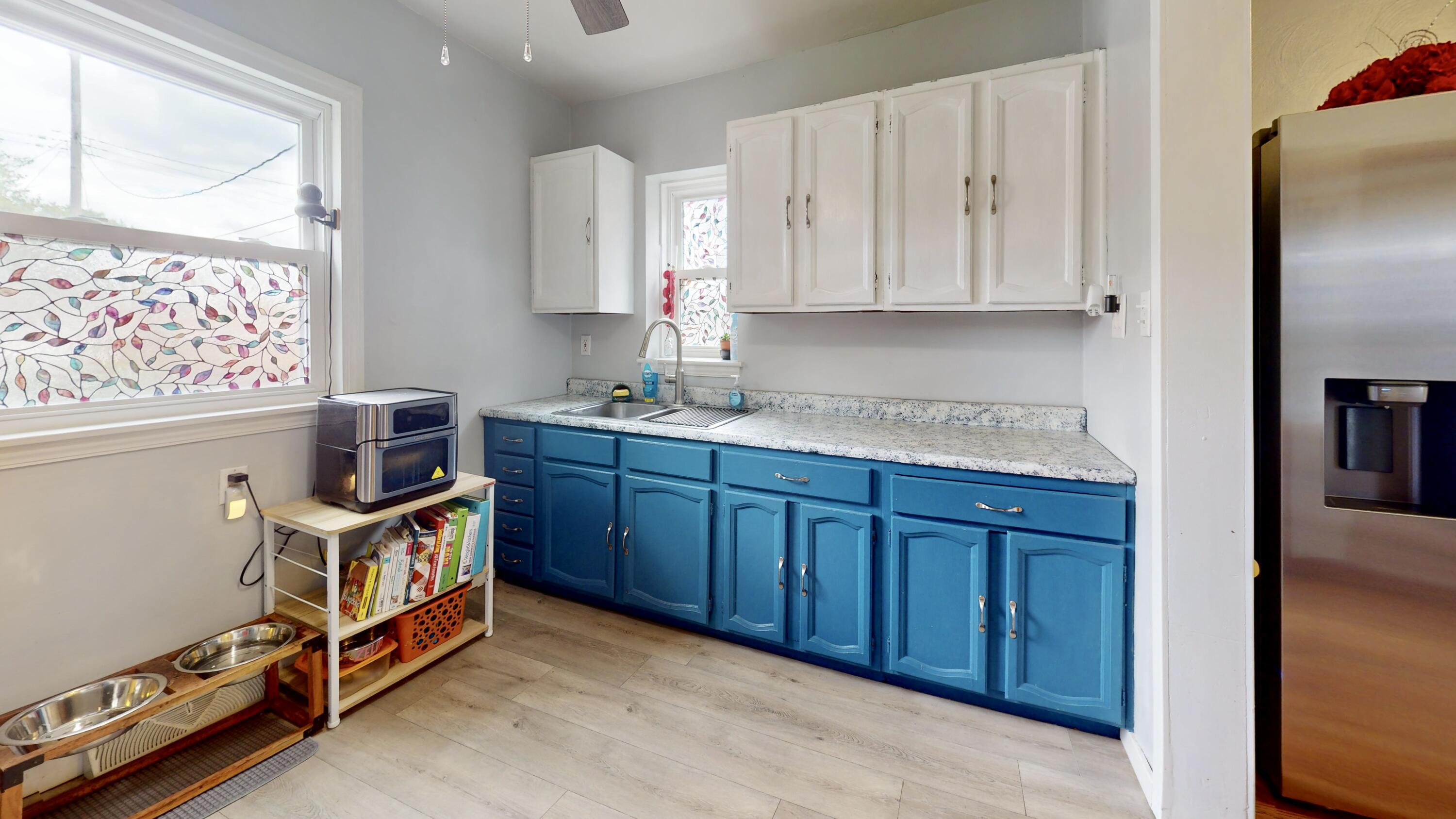7335 Tapper Avenue Hammond, IN 46324 - Photo 12 of 36 a kitchen with stainless steel appliances granite countertop a stove a sink dishwasher and a refrigerator