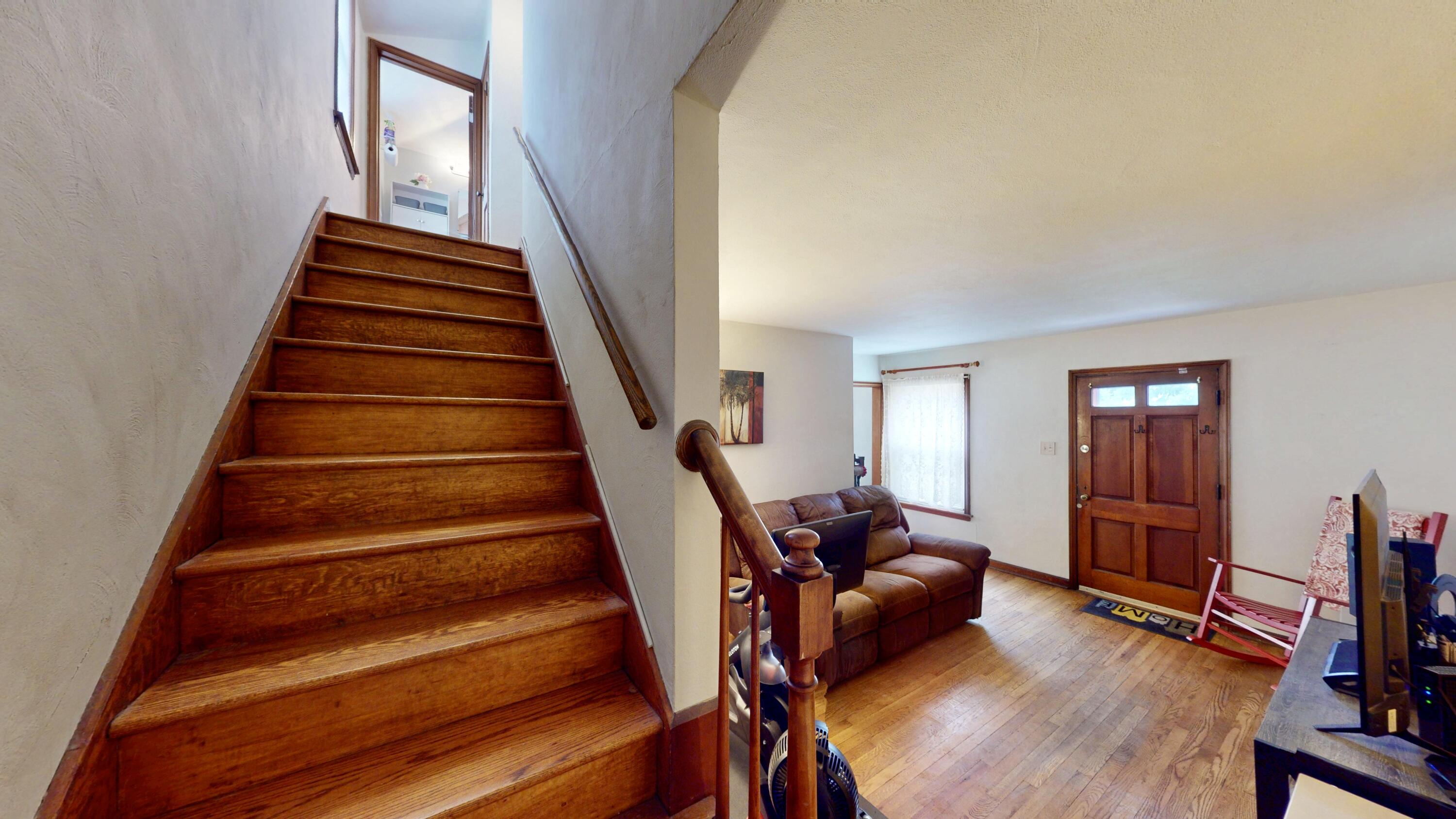 7335 Tapper Avenue Hammond, IN 46324 - Photo 18 of 36 a view of entryway and hall with wooden floor