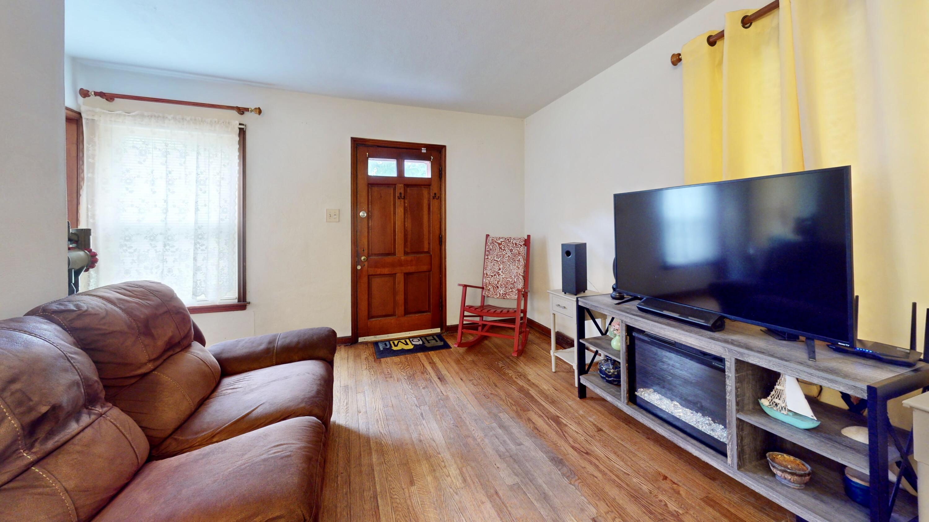 7335 Tapper Avenue Hammond, IN 46324 - Photo 5 of 36 a living room with furniture and a flat screen tv