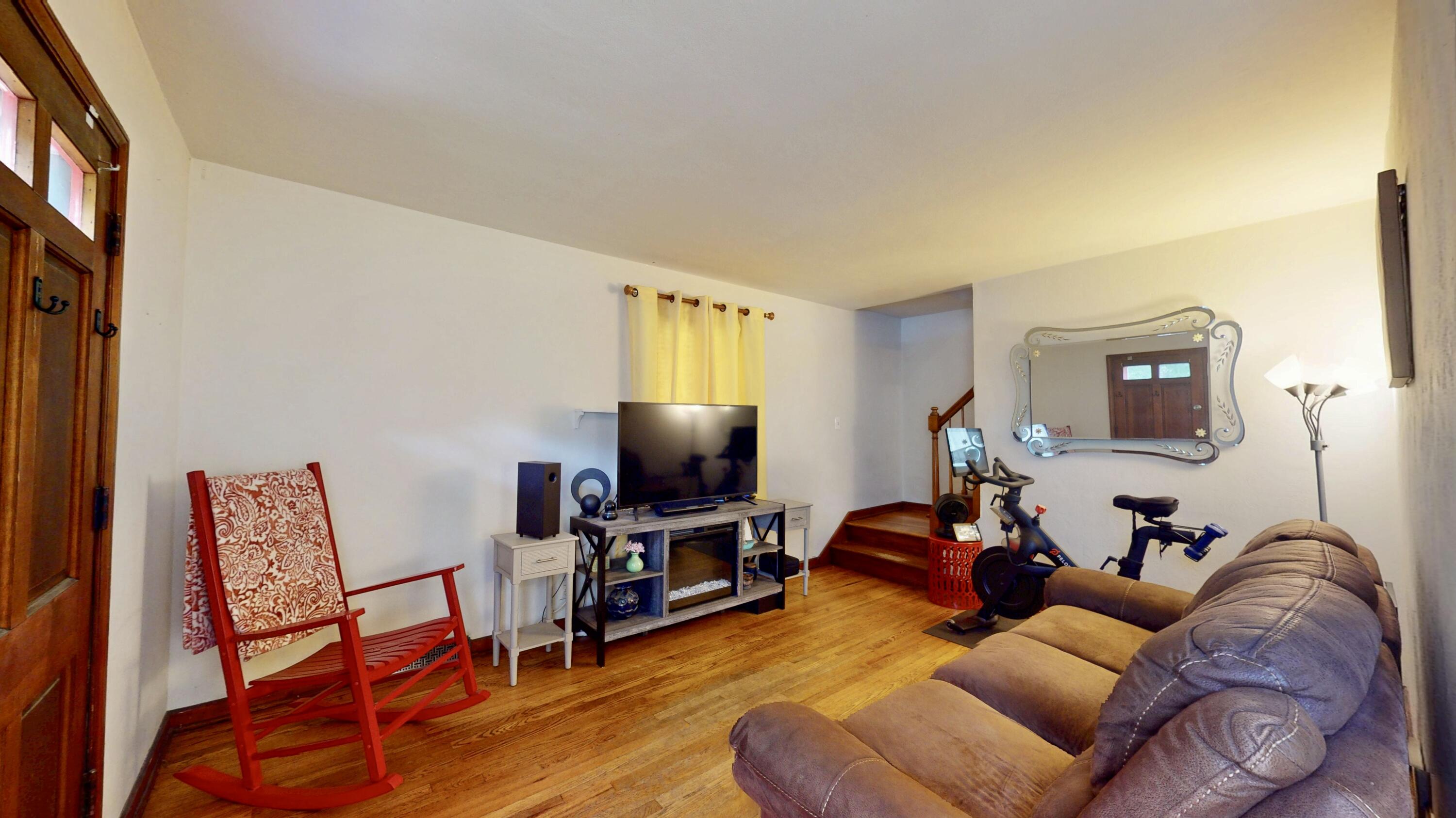 7335 Tapper Avenue Hammond, IN 46324 - Photo 6 of 36 a living room with furniture and a flat screen tv
