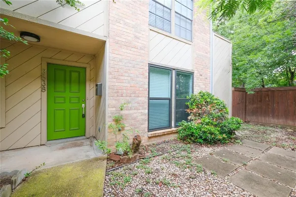 a front view of a house with a garage