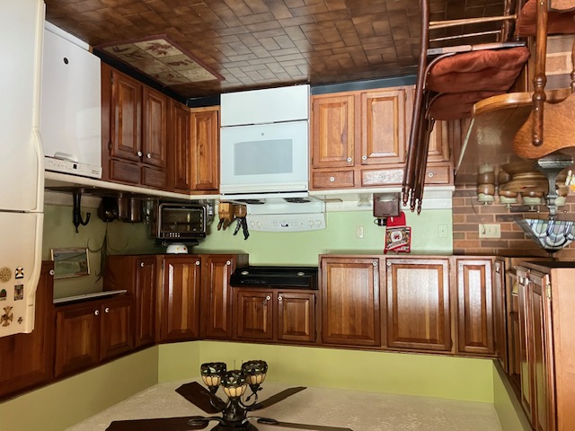 2066 Tolbert Road Hamilton, OH 45011 - Photo 18 of 63 This spacious kitchen offers ample cabinetry and essential appliances for daily living.