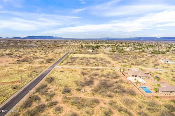 a view of an ocean and a mountain