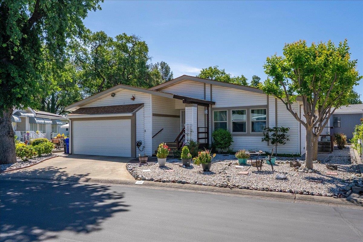 350 Gilmore Road Red Bluff, CA 96080 - Photo 1 of 27 a front view of a house with yard porch and sitting area