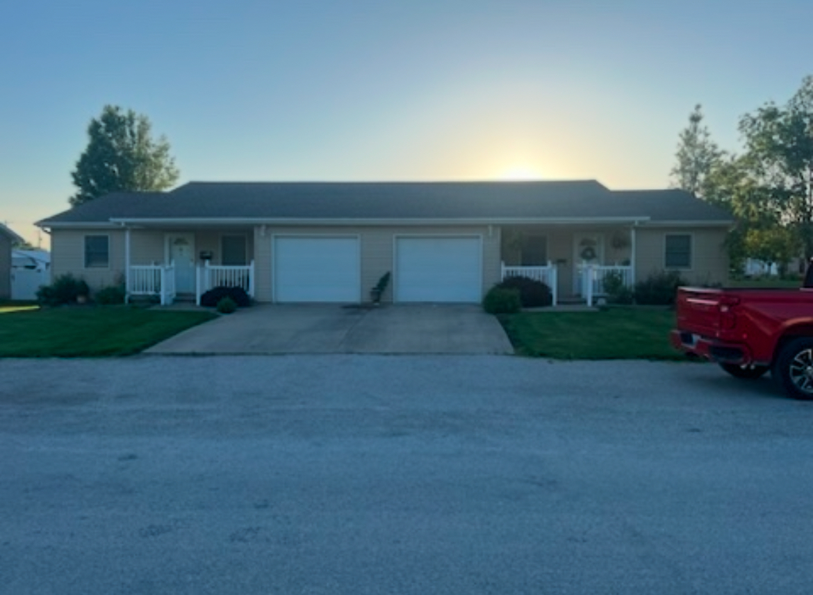 a house view with a garden space