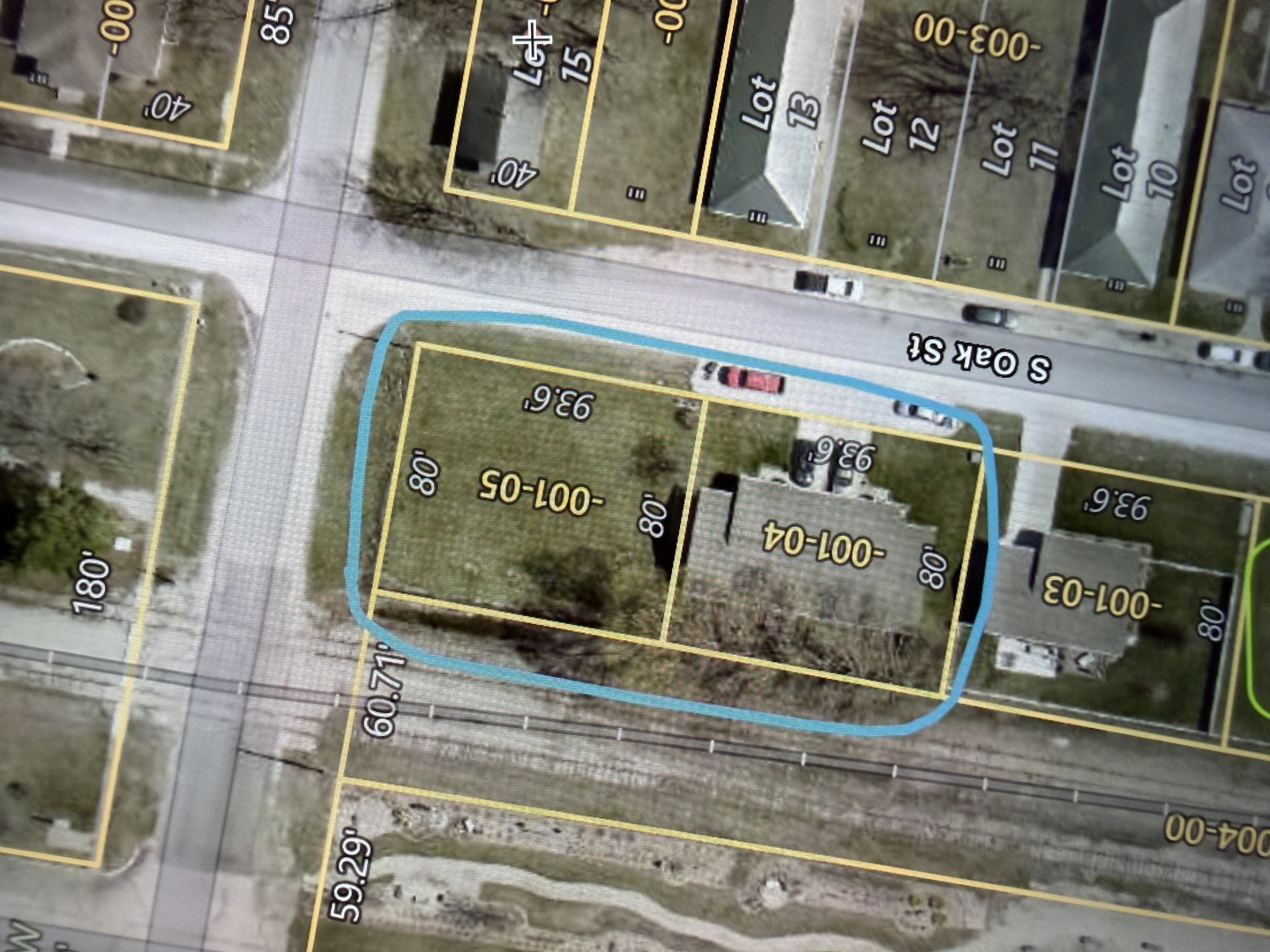 107 South Oak Street Assumption, IL 62510 - Photo 2 of 11 a close up of a street