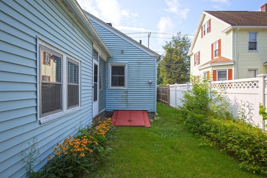 2 Admiral Street Easthampton, MA 01027 - Photo 16 of 21 a backyard of a house with lots of green space