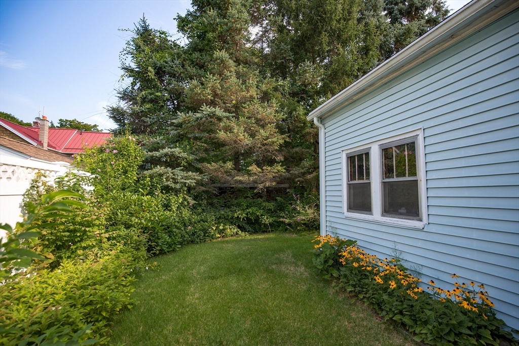 2 Admiral Street Easthampton, MA 01027 - Photo 17 of 21 a backyard of a house with lots of green space