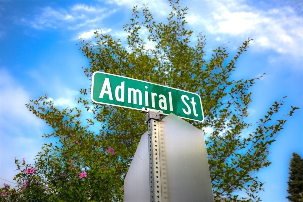 2 Admiral Street Easthampton, MA 01027 - Photo 20 of 21 a sign that is sitting in front of flowers