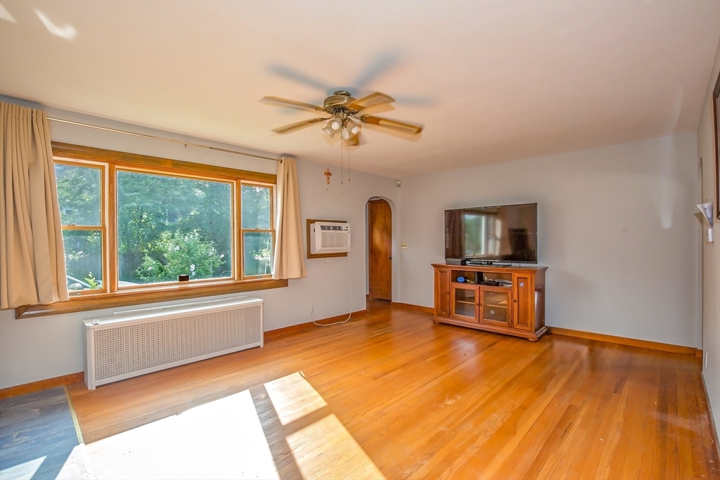 2 Admiral Street Easthampton, MA 01027 - Photo 5 of 21 a living room with furniture and a flat screen tv