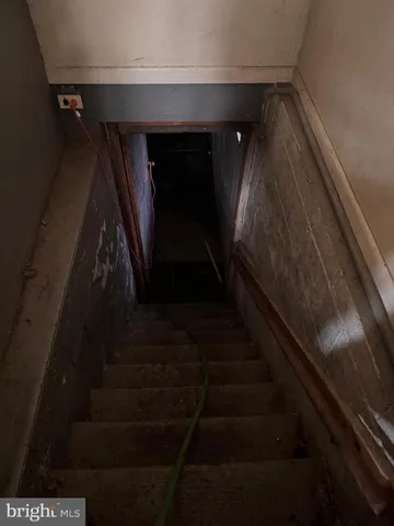 a view of house with yard and green space