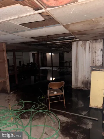 a view of a car parked in front of a house