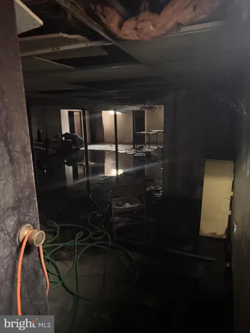 a view of a house with swimming pool and a yard