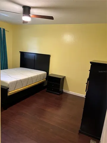 a view of an empty room with a large window