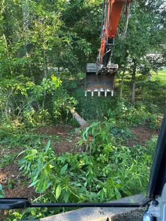 a backyard of a house with lots of green space