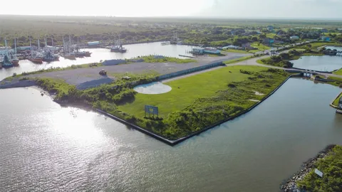 an aerial view of a residential building with an ocean