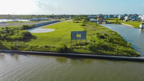 a view of a lake with a big yard