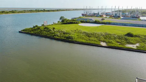 a view of a swimming pool with an ocean view