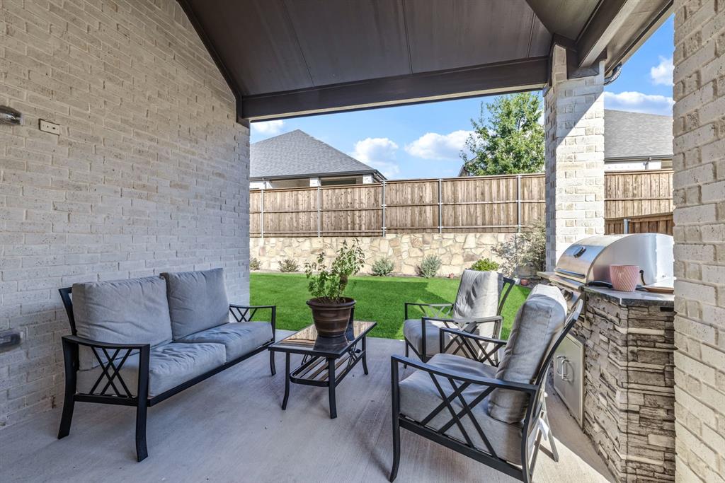 1302 Shorefront Drive Allen, TX 75013 - Photo 20 of 40 a outdoor living space with furniture and a potted plant