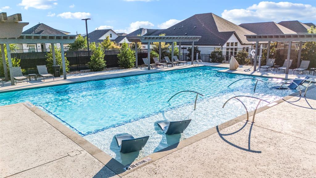 1302 Shorefront Drive Allen, TX 75013 - Photo 34 of 40 a view of a house with backyard porch and sitting area