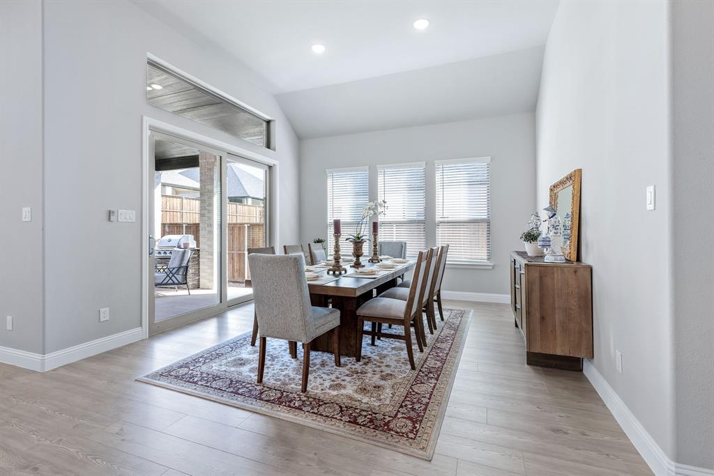 1302 Shorefront Drive Allen, TX 75013 - Photo 4 of 40 a view of a dining room with furniture