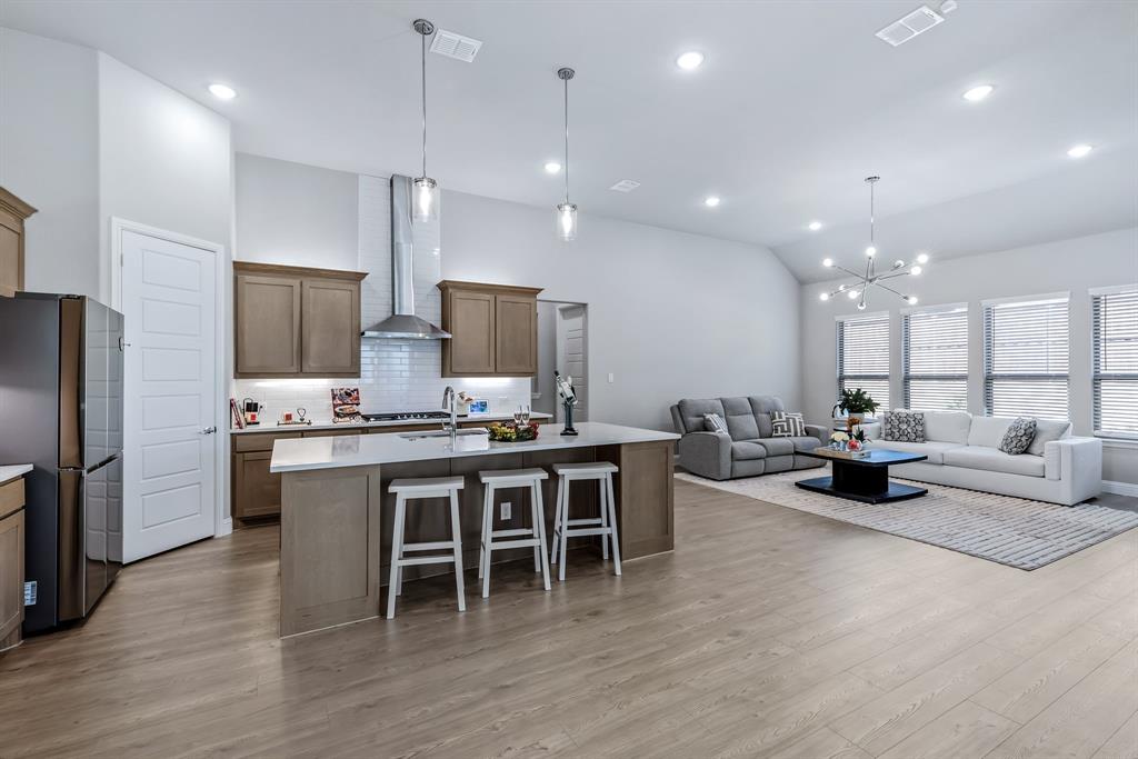 1302 Shorefront Drive Allen, TX 75013 - Photo 40 of 40 a large kitchen with a table and chairs